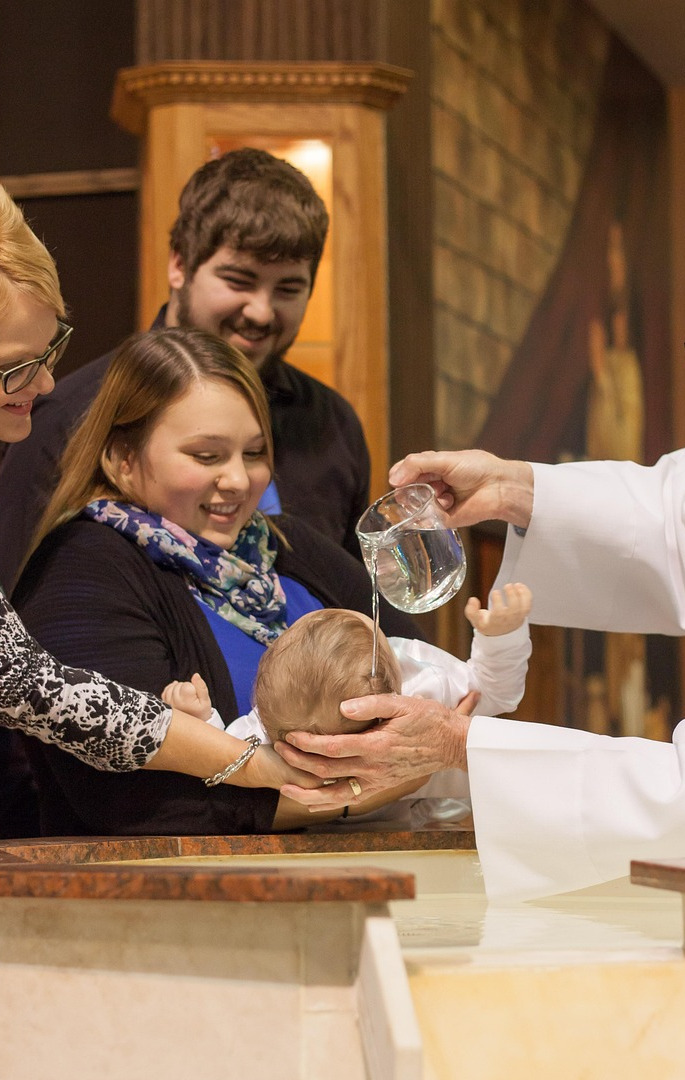 catholic baptism baby water